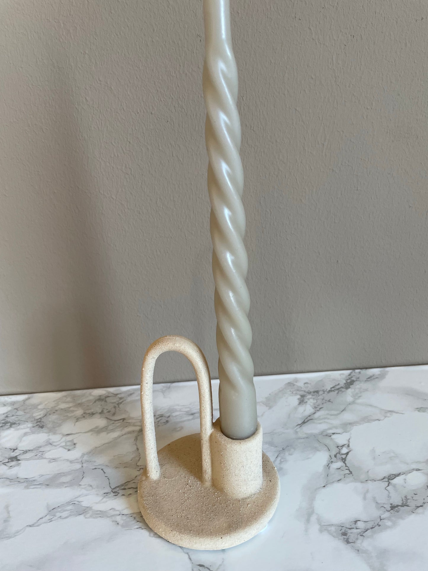 Beige kandelaar boog